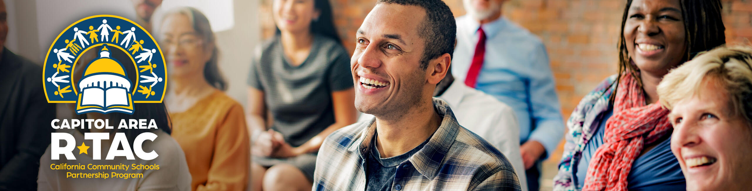 A diverse group of adults enjoy the experience of learning together.