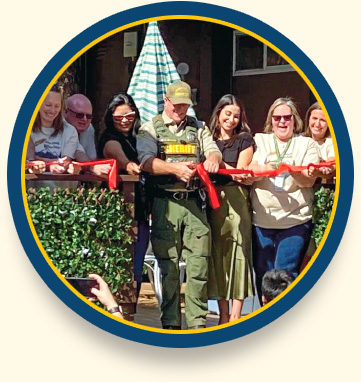 People partake in a ribbon cutting ceremony for the Alpine County Wellness Center